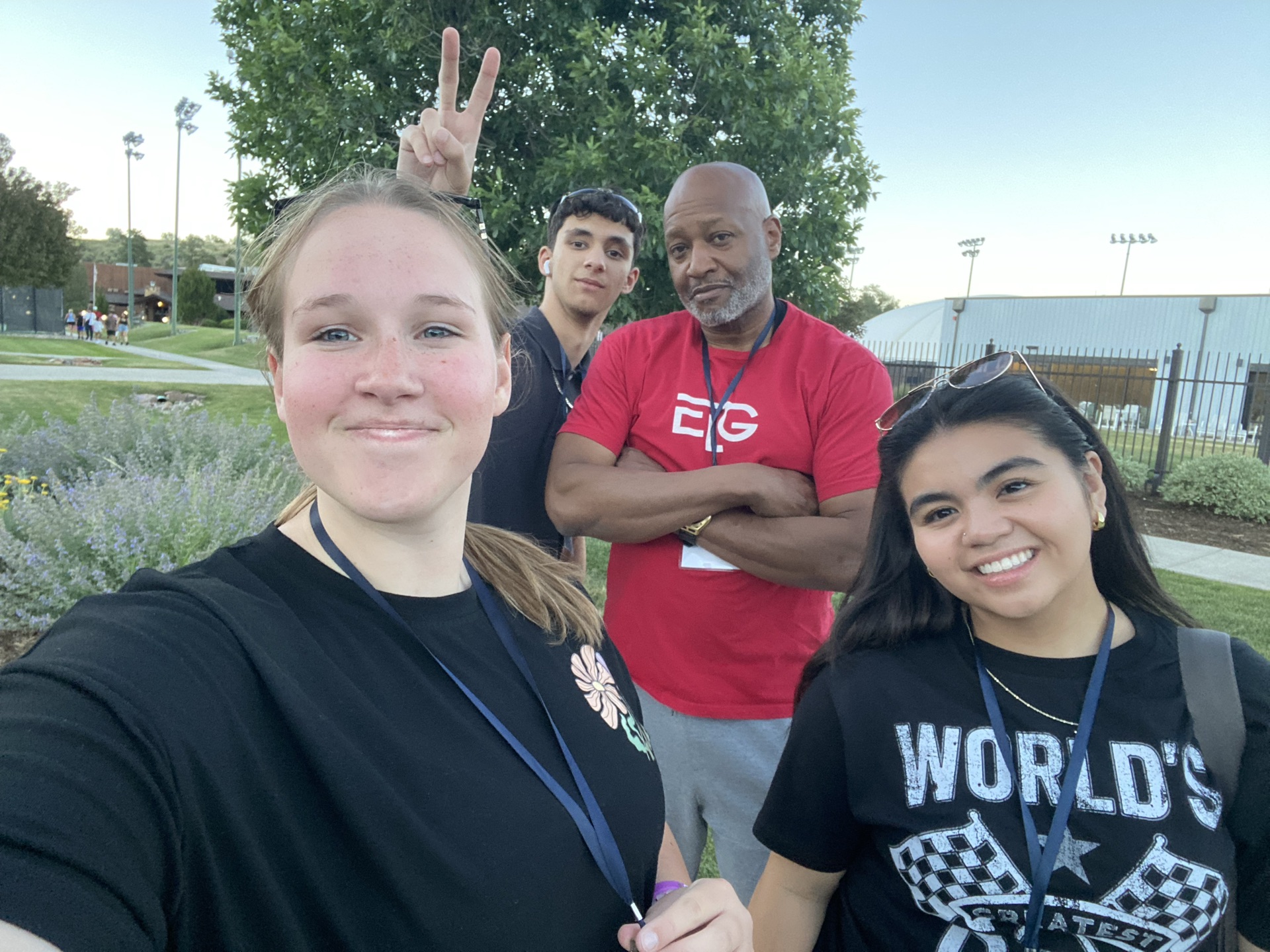 Charlee and fellow youth delegates connecting with an adult program leader