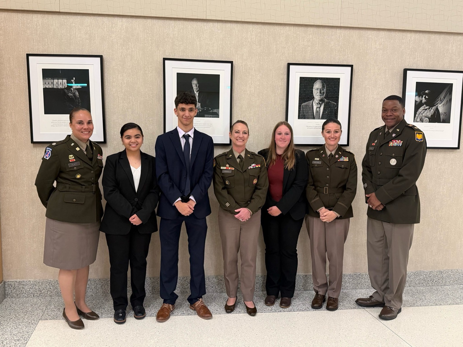Three National Guard youth representatives meeting Army leaders