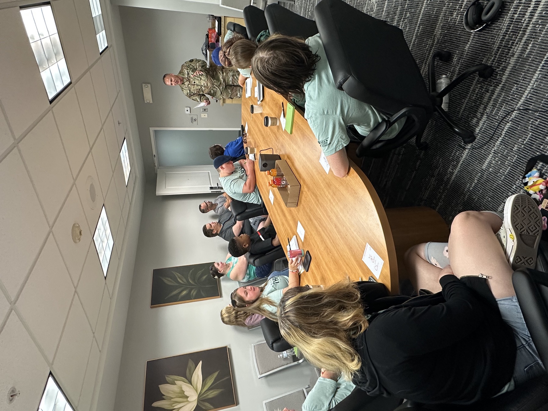 Military-connected teens listening to a speaker during a Region 7 leadership session