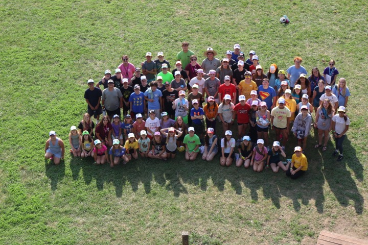 Military-connected youth and camp staff gathered outdoors during the 2026 Iowa Military Youth Summer Camp