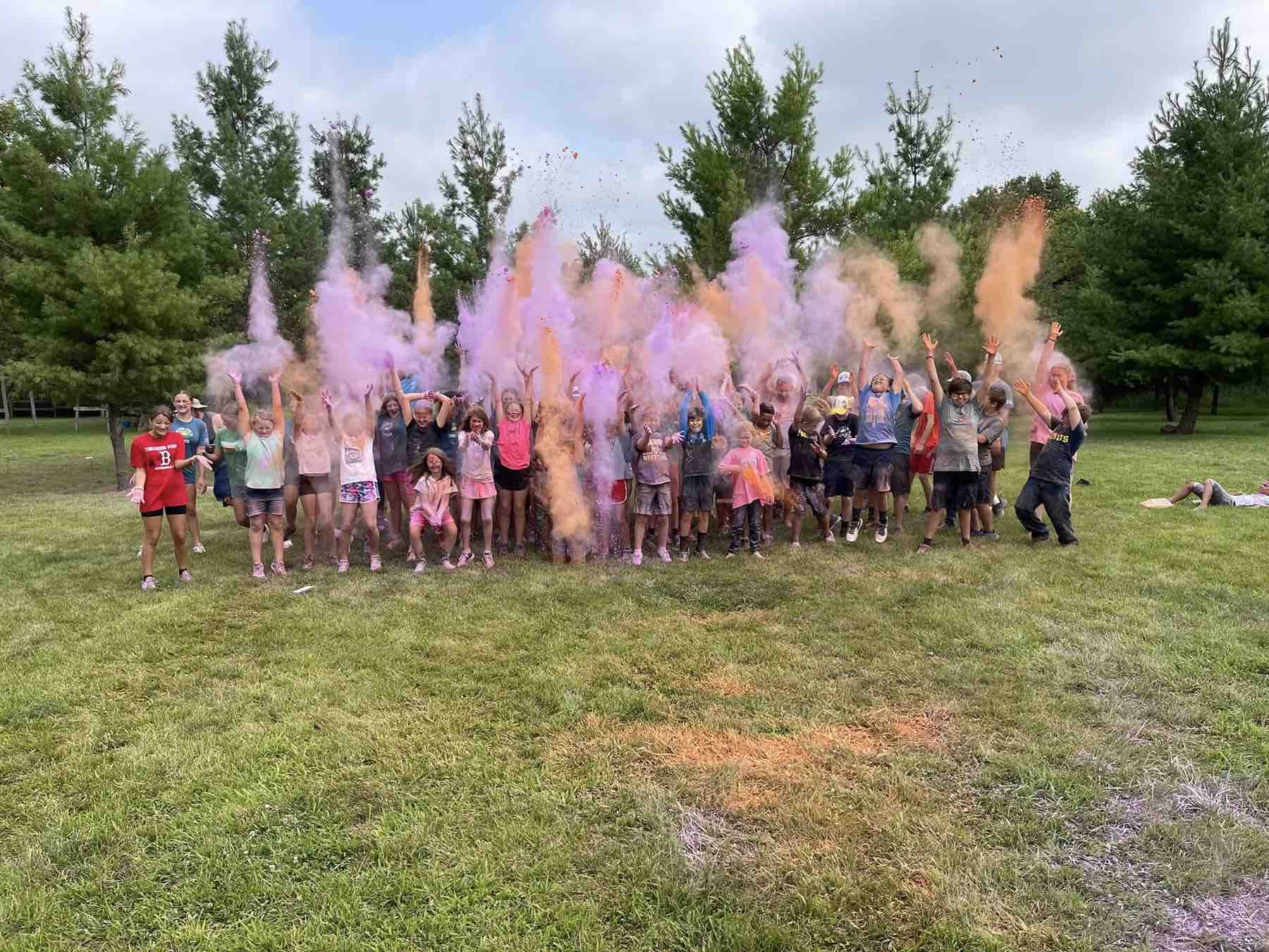 Guard-connected families cheering together at a CYP celebration
