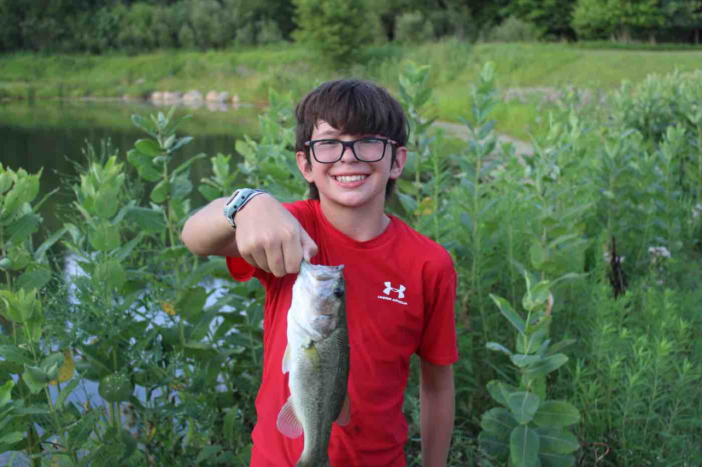 Iowa CYP team member guiding a Guard-connected student through a workshop